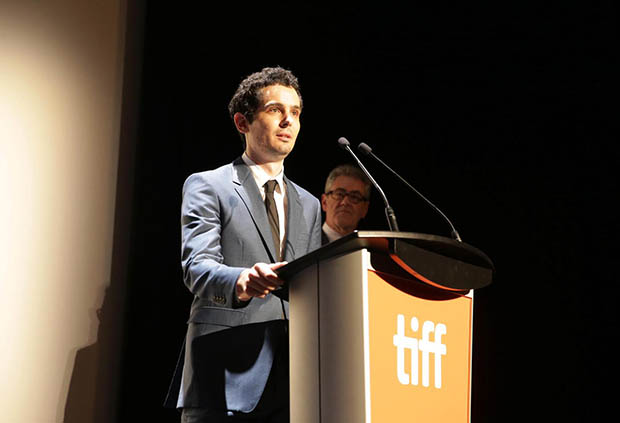 Writer/Director Damien Chazelle speaks at Summit Entertainment's "La La Land" premiere at the 2016 Toronto International Film Festival on Monday, Sept. 12, 2016, in Toronto. (Photo by Eric Charbonneau/Invision for LionsgateAP Images)